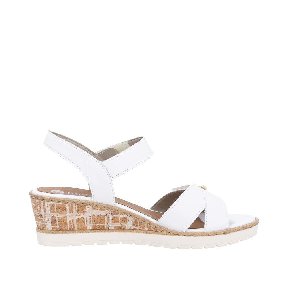 White leather ladies' wedge sandals with touch fastening straps and cork heel.