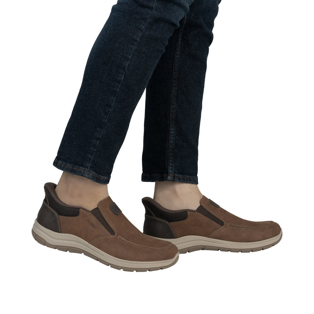 Rieker 03655-24 men's wide fit brown leather slip-on shoes with cushioned soles and dark accents.