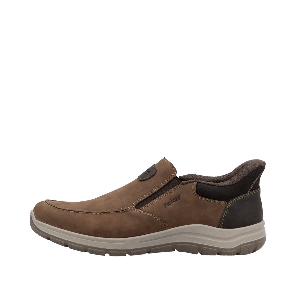 Rieker 03655-24 men's wide fit brown leather slip-on shoes with cushioned interior and flexible rubber sole.