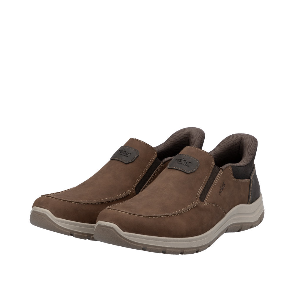 Rieker men's wide brown leather slip-on shoes with cushioned collar and durable rubber outsole.