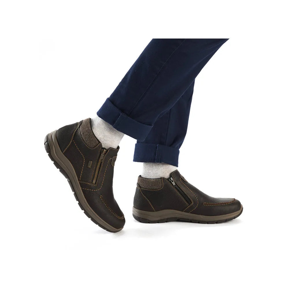 Rieker men's brown water-resistant leather ankle boots with twin zippers and rugged sole.