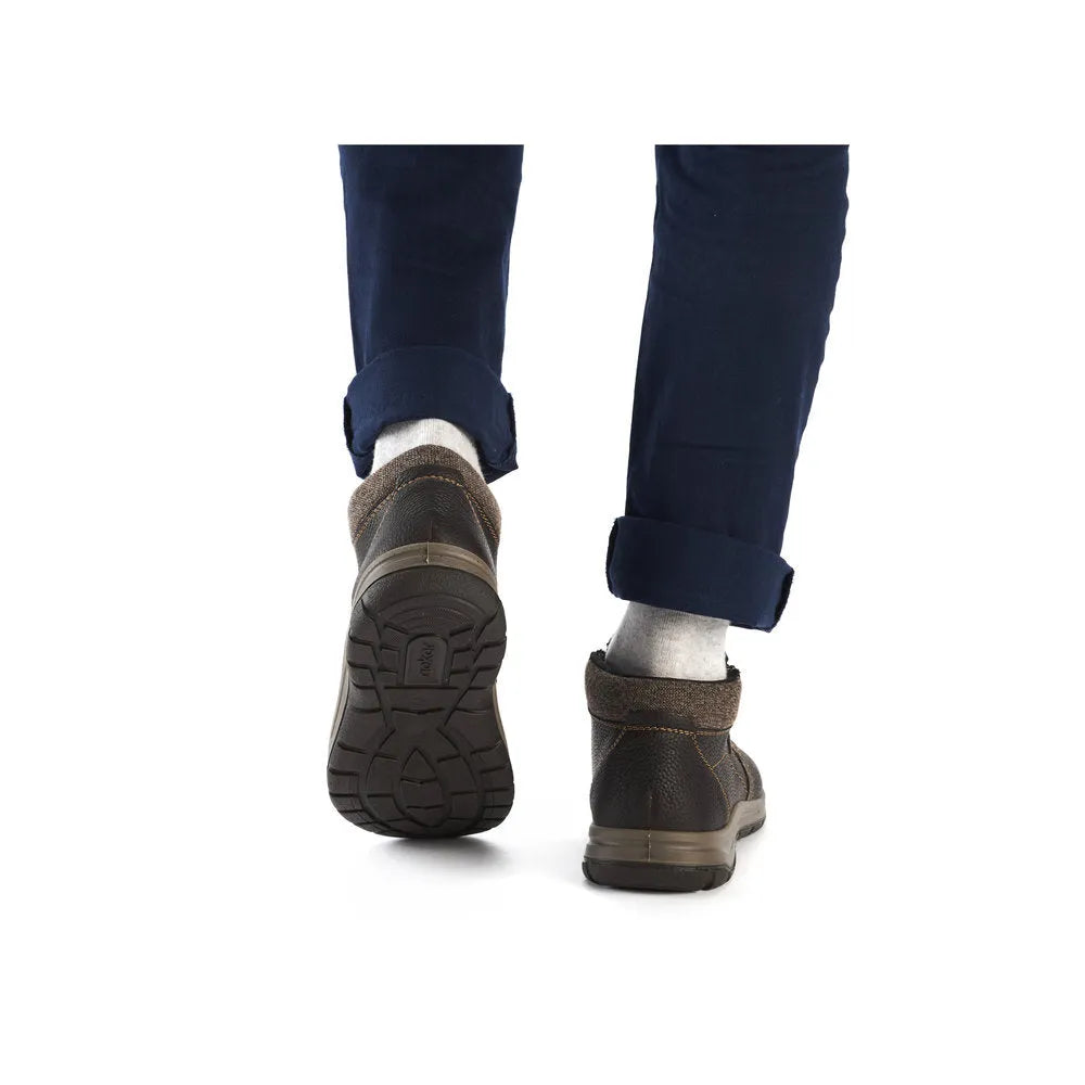 Rieker 03660-25 men's brown water-resistant leather ankle boots with twin zippers and rugged soles.