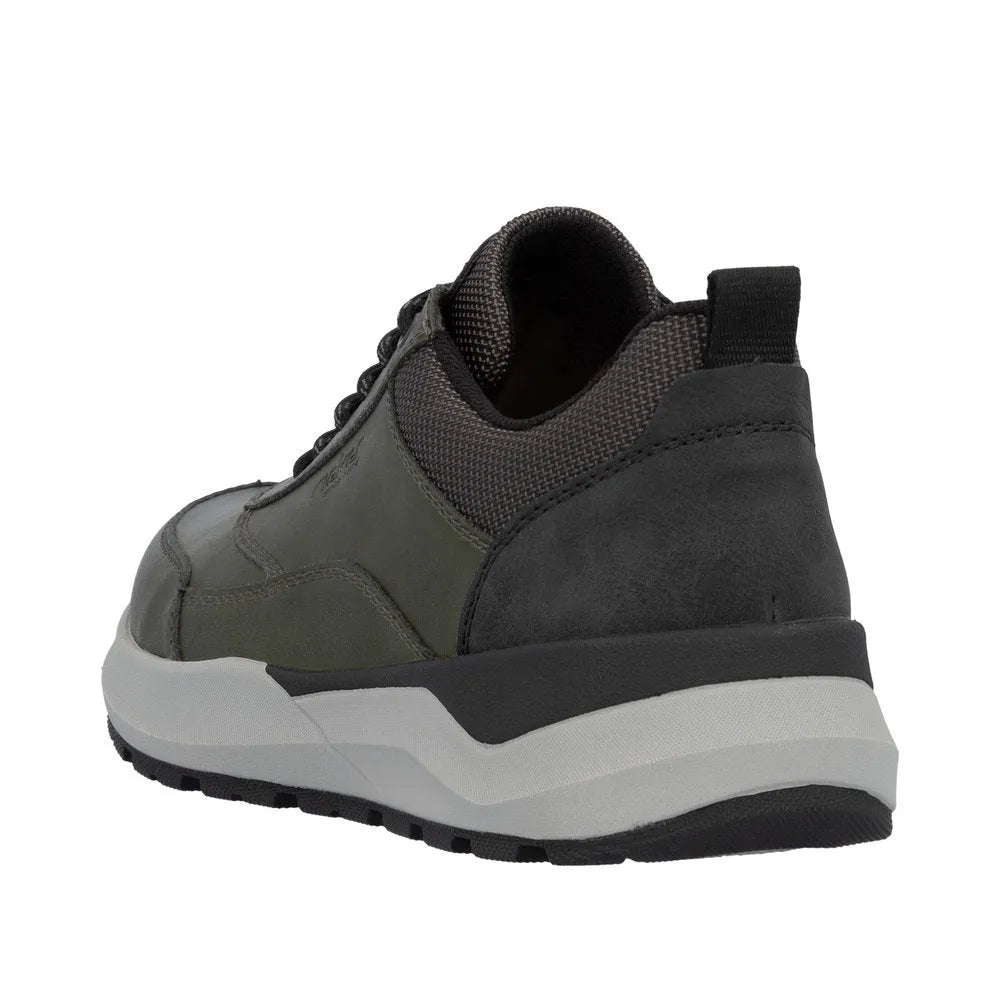 Rieker men's green zip and lace-up casual shoe with chunky sole, black heel, and textured fabric details.