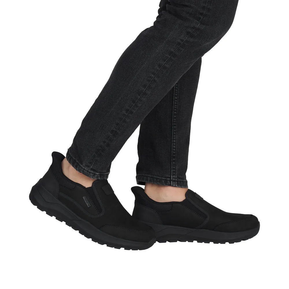 Rieker 06052-00 men's black suede water-resistant slip-on shoes with durable outsole.