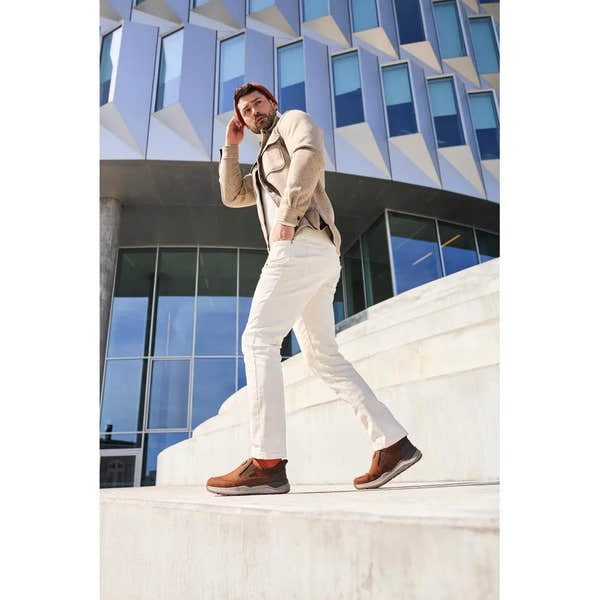 Rieker 06052-22 Men's brown suede slip-on shoes with water resistance, stylish and comfortable for everyday wear.