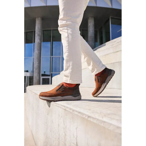 Rieker 06052-22 men's brown suede waterproof slip-on shoes, casual footwear with sporty design and comfortable sole.