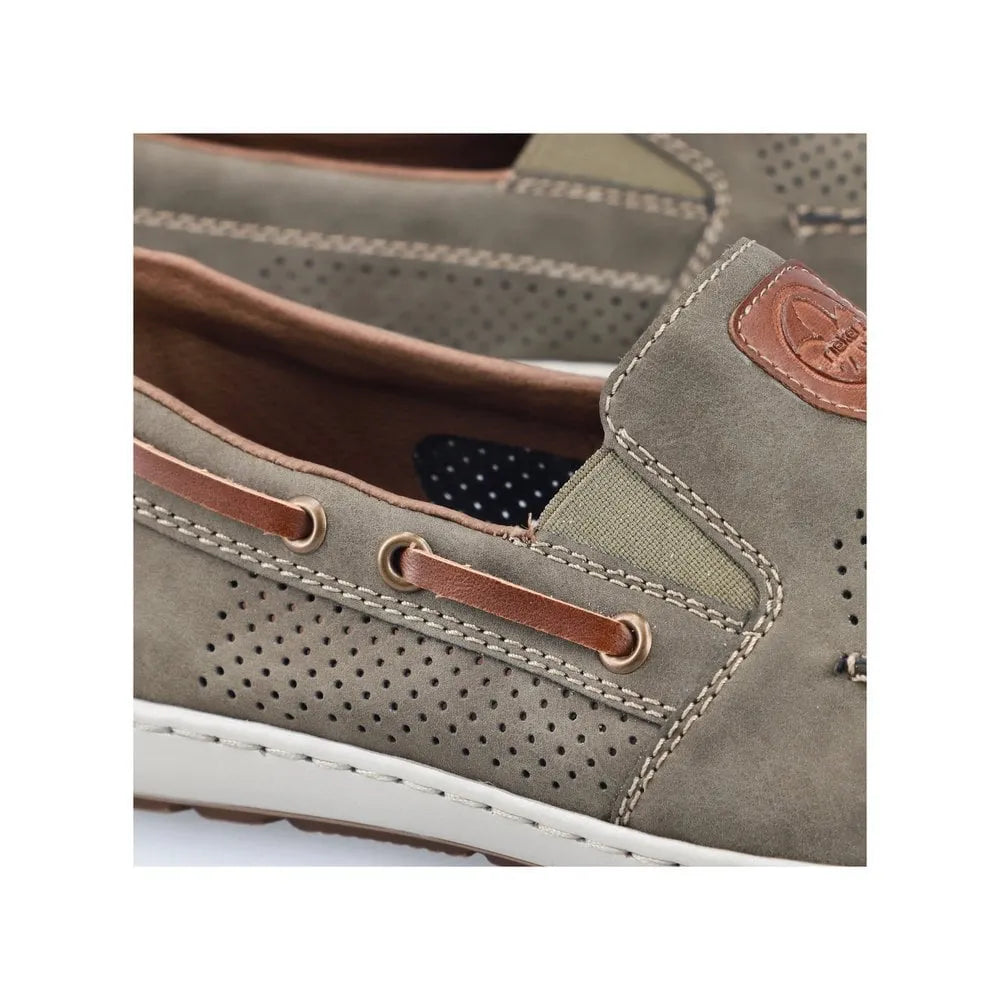Rieker 08866-54 men's green slip-on deck shoes with perforated design, brown leather accents, and white sole.