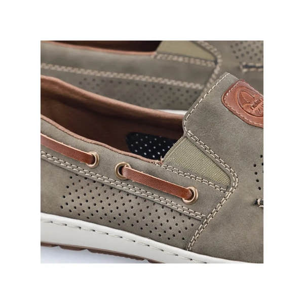 Rieker 08866-54 men's green slip-on deck shoes with perforated design, brown leather accents, and white sole.