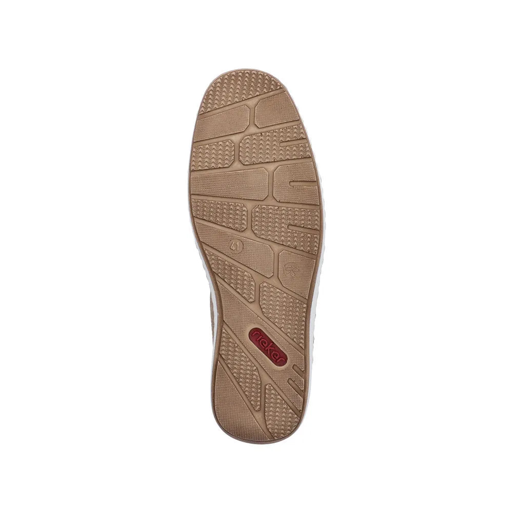 Beige slip-on deck shoe with textured rubber sole, stitched details, and 