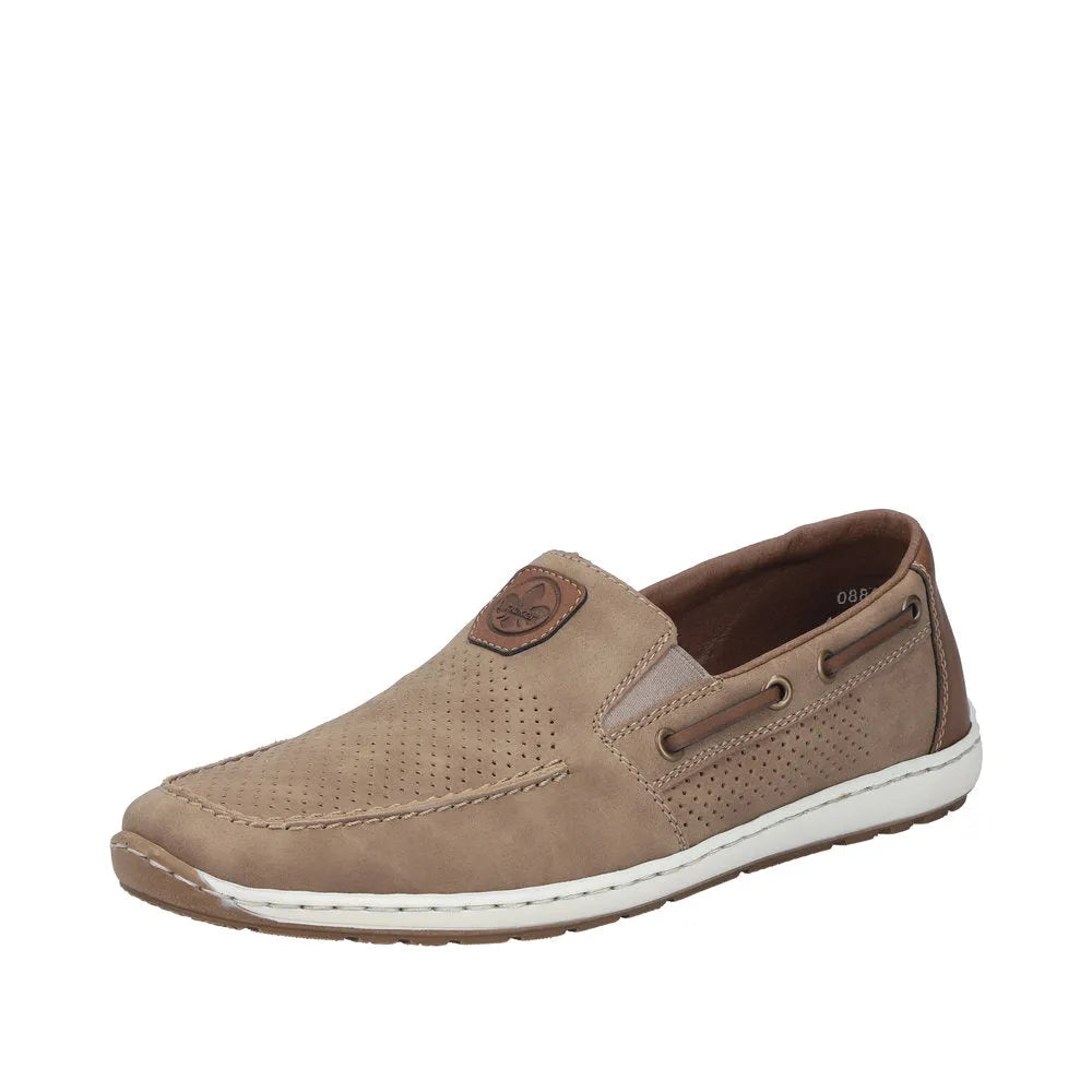 Beige slip-on deck shoe with perforated upper, brown accents, white sole, and decorative side lacing.