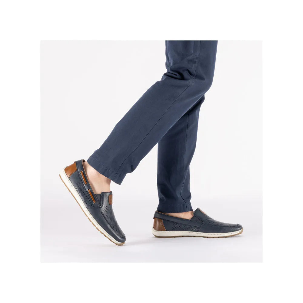 Men's wide Pacific blue leather slip-on shoes with elasticated sides and brown heel accents, casual style.