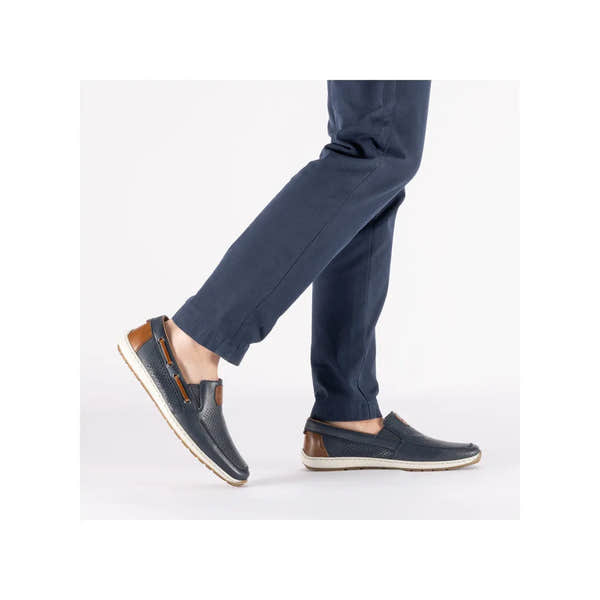 Men's wide Pacific blue leather slip-on shoes with elasticated sides and brown heel accents, casual style.