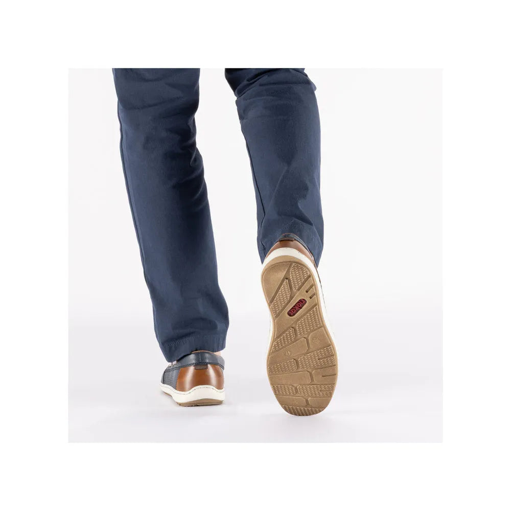 Men's wide Pacific blue leather elasticated shoes with tan accents and a beige rubber sole, displayed from behind.
