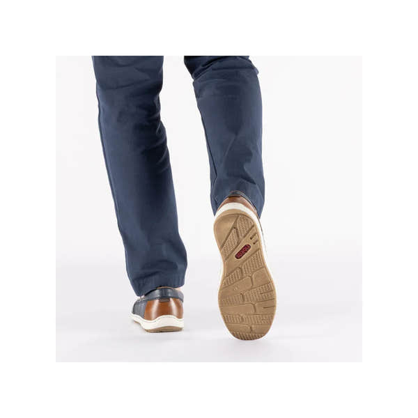 Men's wide Pacific blue leather elasticated shoes with tan accents and a beige rubber sole, displayed from behind.