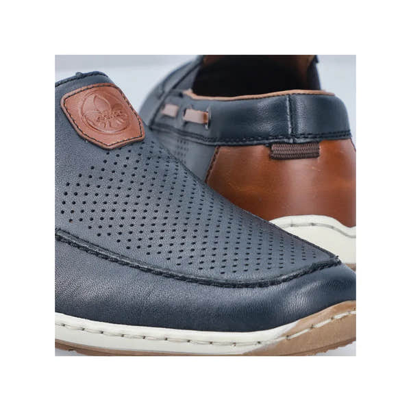 Mens wide Pacific blue leather elasticated shoes with perforated toe and tan accents.