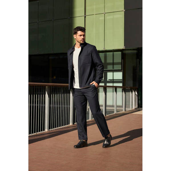 Rieker 10353-00 men's wide fit black leather slip-on shoes, stylish and comfortable for casual or business wear.