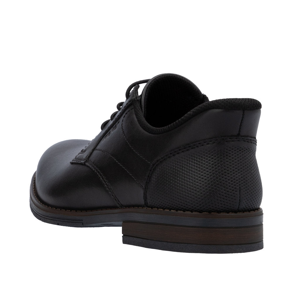 Rieker 10353-00 men's black leather slip-on shoes with wide fit and textured heel detail.