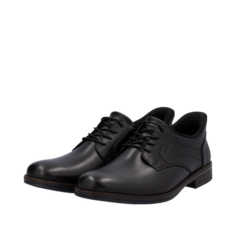 Rieker 10353-00 men's black leather slip-on shoes with lace-up closure, wide fit, cushioned interior, and low heel for comfort.
