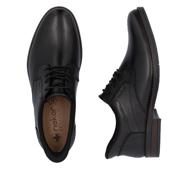 Rieker 10353-00 men's wide fit black leather slip-on shoes with lace-up closure and cushioned sole.