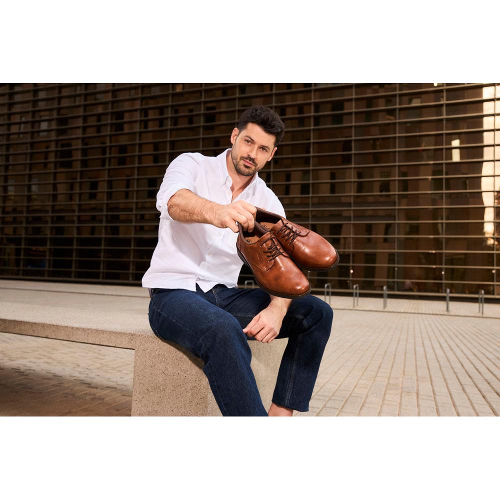 Men's wide fit brown leather lace-up shoes, stylish and polished for formal or casual wear.