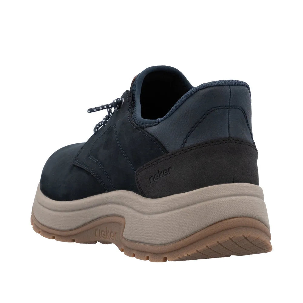 Rieker 11050-14 men's blue suede wide fit slip-on shoes with cushioned sole and chunky beige outsole.