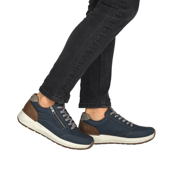 Rieker 11504-14 men's wide navy shoes with zip and lace-up closure, brown heel accents, gray laces, and cushioned white sole.