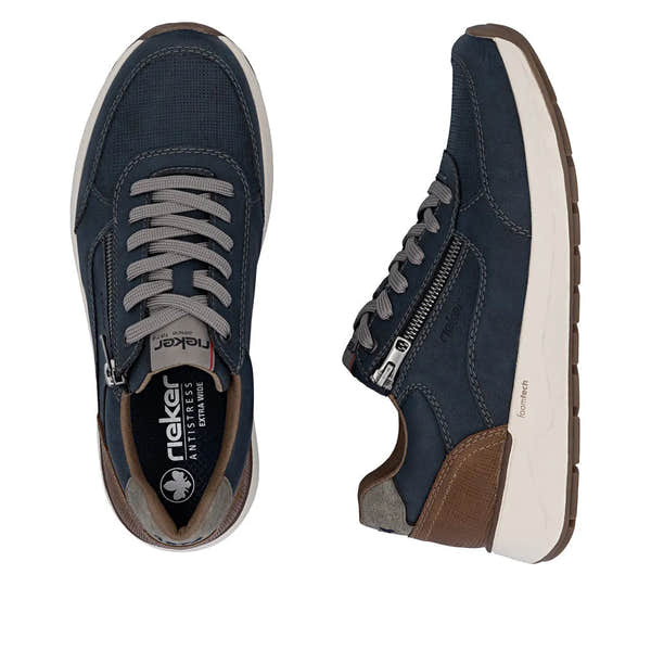 Men's navy blue leather and textile sneakers with grey laces, side zipper, brown accents, and white sole.