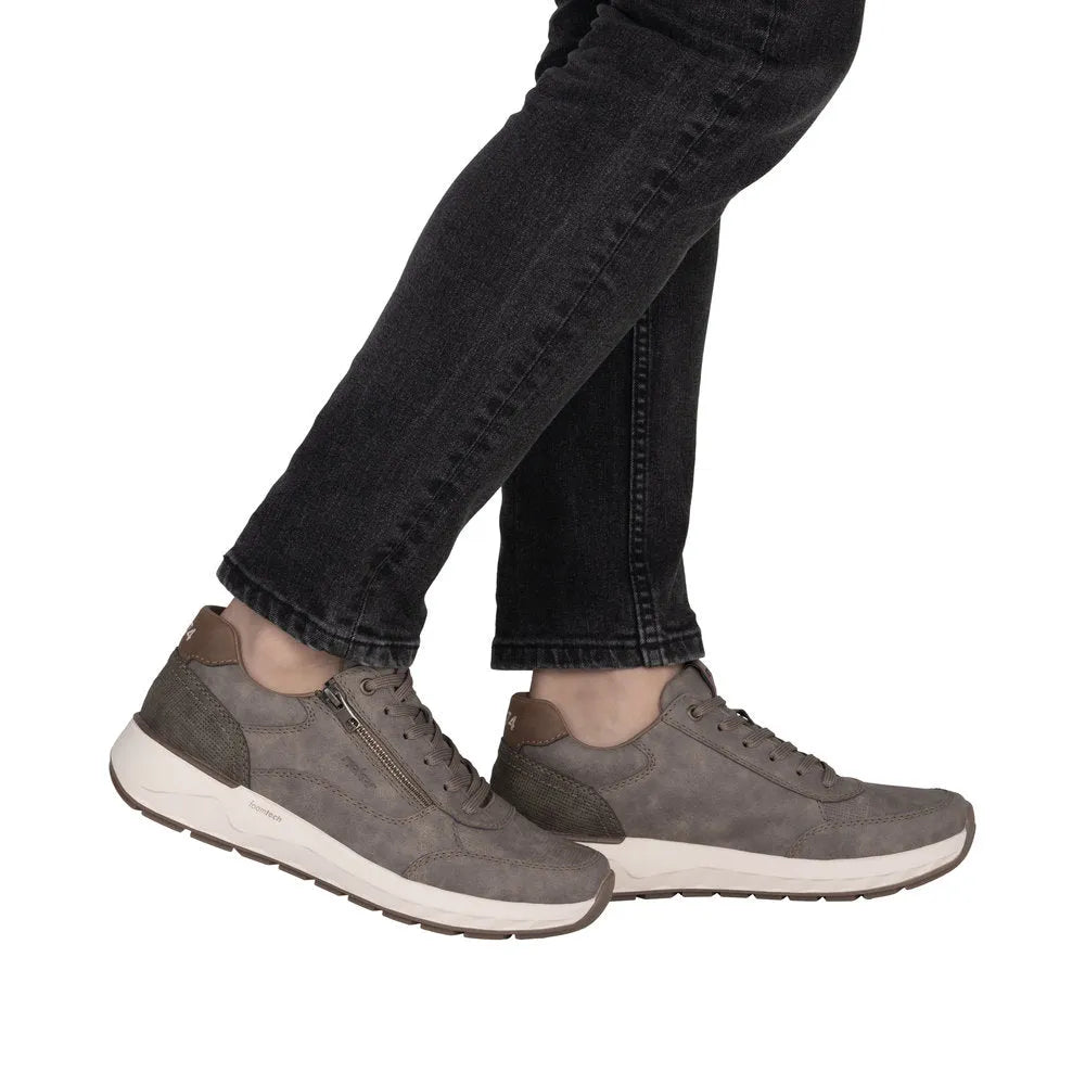 Rieker men's wide brown zip and lace sneakers with leather and suede materials, white sole, and padded ankle collar.