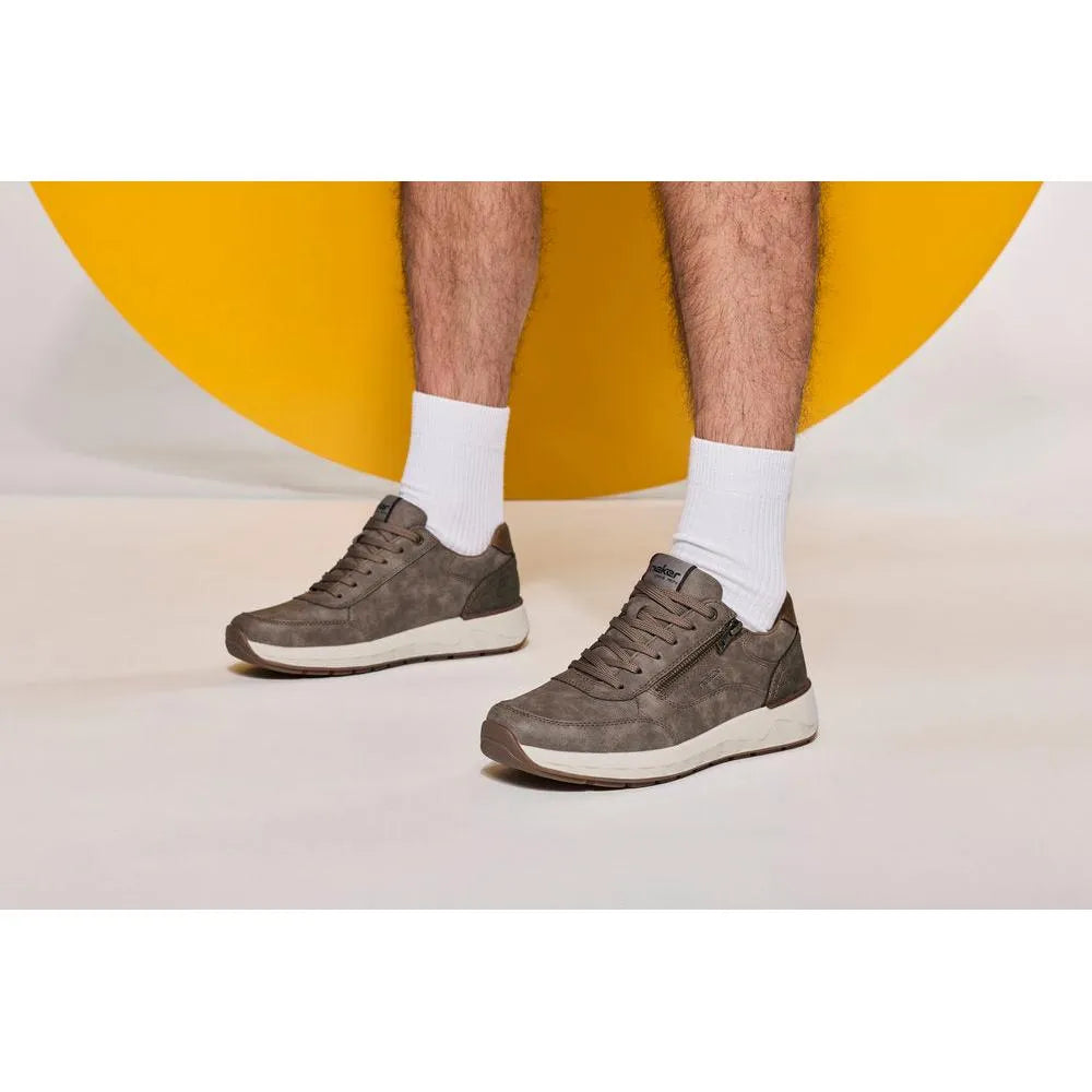 Men's wide brown suede zip and lace shoes with white soles, paired with white socks.
