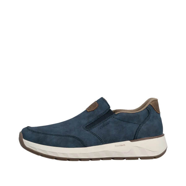Men's wide denim blue slip-on shoes with suede accents, cushioned white sole, and breathable interior.