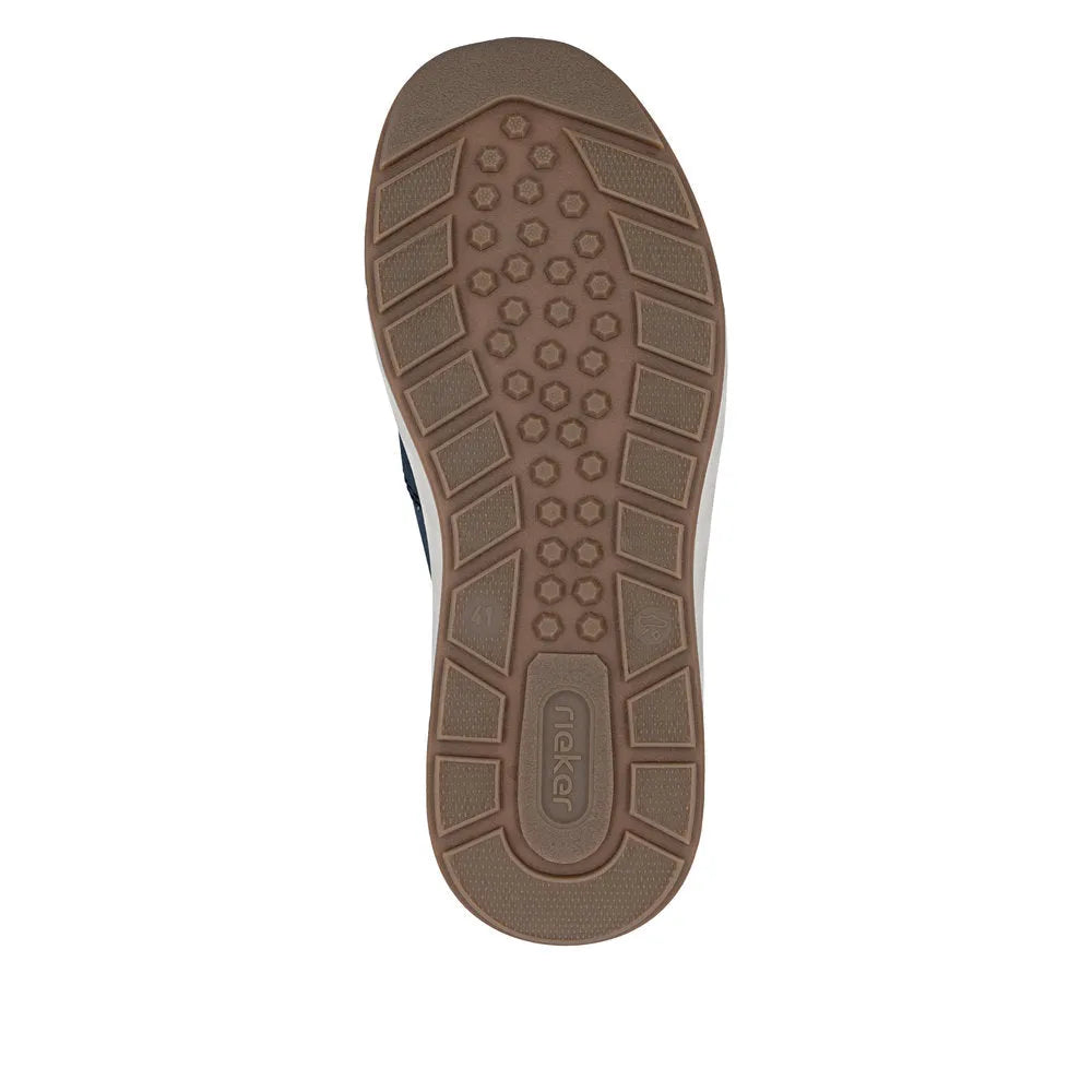 Blue slip-on men's shoes with wide denim-like material, rubber sole, and textured tread pattern.