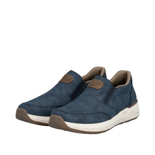 Blue slip-on men's shoes with suede upper, tan accents, and white and brown sole.