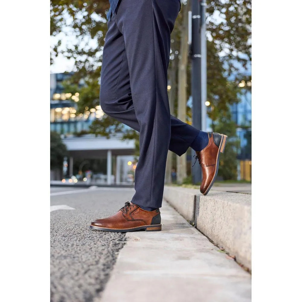Men's brown leather lace-up shoes with a sleek style, black accents, and durable soles.