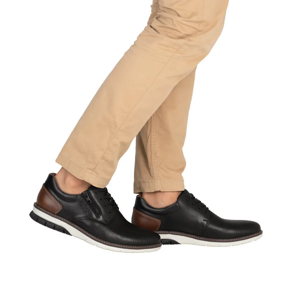 Rieker 14412-00 men's black leather shoes with zip, lace-up, brown accents, and white sole.
