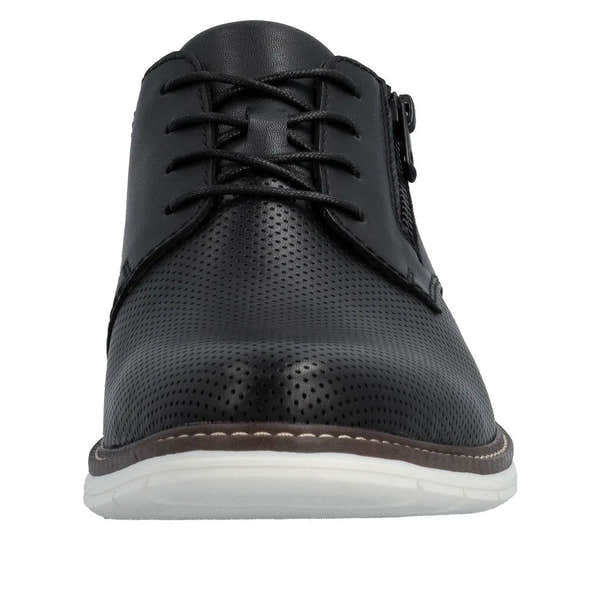 Black leather men's dress shoe with perforated toe, lace-up front, and side zipper, on a white sole.