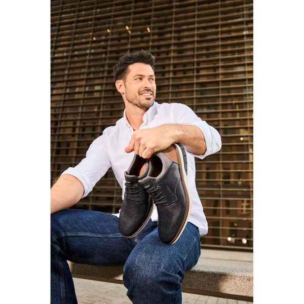 Rieker 14450-15 men's navy and brown leather slip-on shoes, casual footwear with stylish design and comfortable fit.