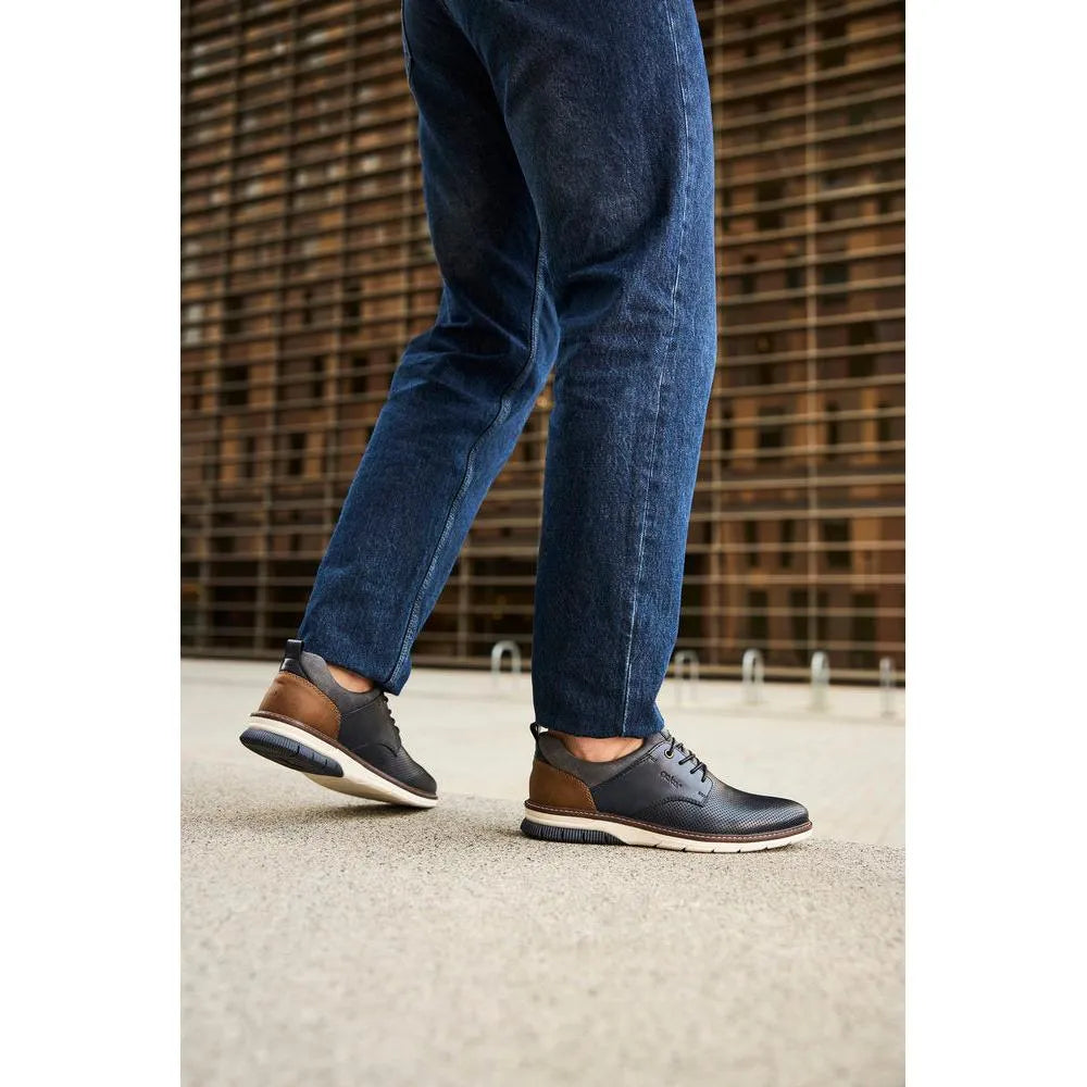 Rieker 14450-15 men's navy and brown leather slip-on shoes, stylish casual footwear with comfortable design.
