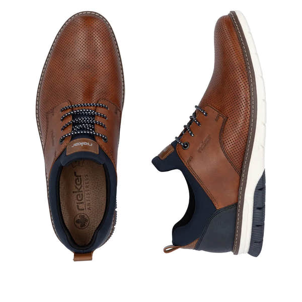 Rieker 14450-22 men's brown and navy leather slip-on shoes with perforated detailing and white rubber sole.