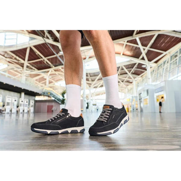 Rieker 15900-14 men's wide navy leather lace-up shoes with side zipper, sporty design, white sole, and brown accents.