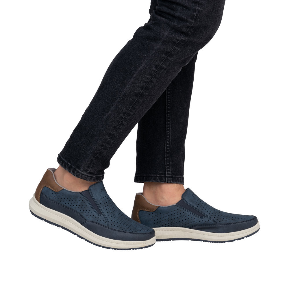 Rieker 16952-14 men's wide navy slip-on shoes with brown accents, perforated design, and white rubber soles.