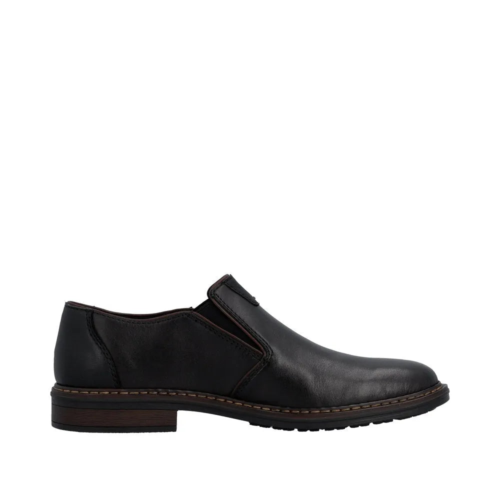 Black leather men's wide fit slip-on shoes with elastic sides and a low heel.