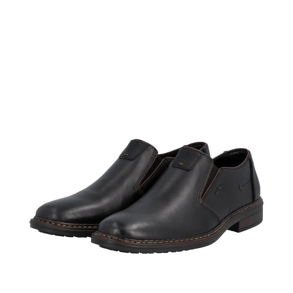 Black leather men's wide elasticated slip-on shoes with low heel and contrast stitching.