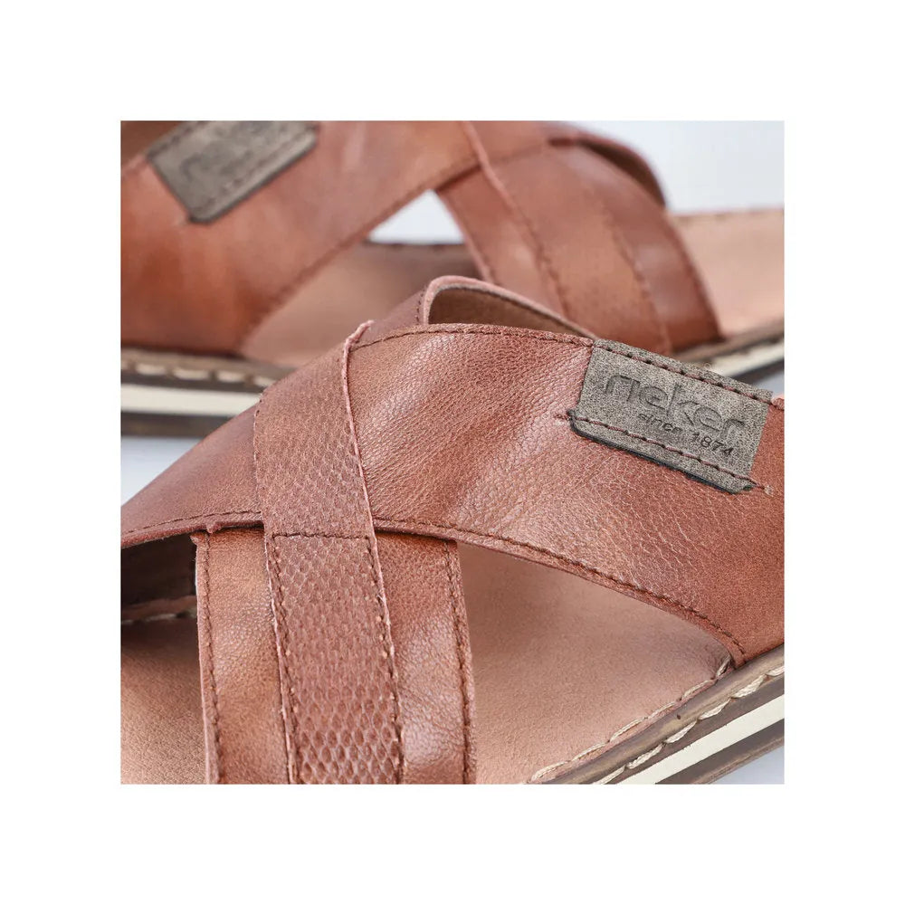 Rieker 21082-24 men's brown leather slip-on sandals with cross strap design and textured finish.