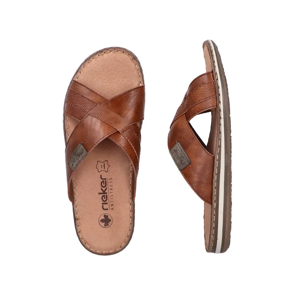 Rieker 21082-24 men's brown leather slip-on sandals with cross-strap design and cushioned footbed.