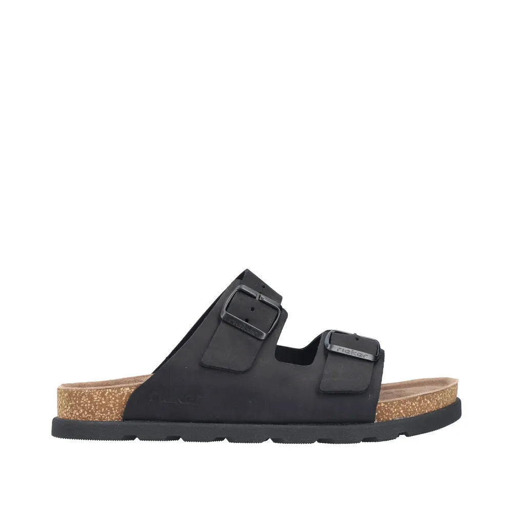 Rieker 21190-00 men's wide fit black suede buckle mules with cork footbed and outsole.