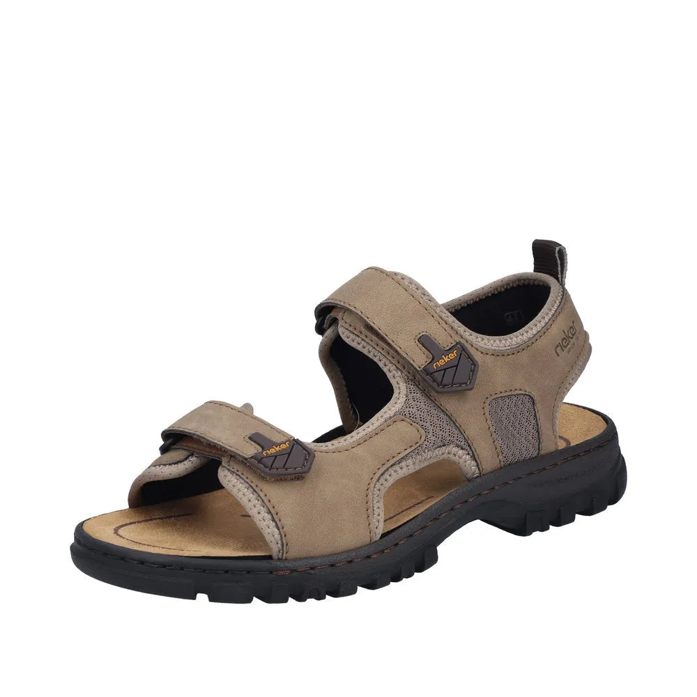 Rieker 25055-64 men's wide fit sandal with touch fastening straps, beige stone color, cushioned insole, and rugged outsole.