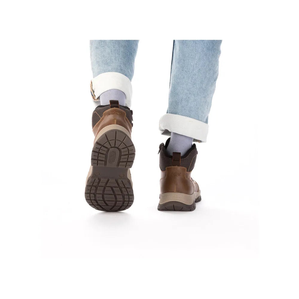 Rieker 30230-22 men's brown water-resistant ankle boots with zip and lace closures, rugged sole, and waterproof design.