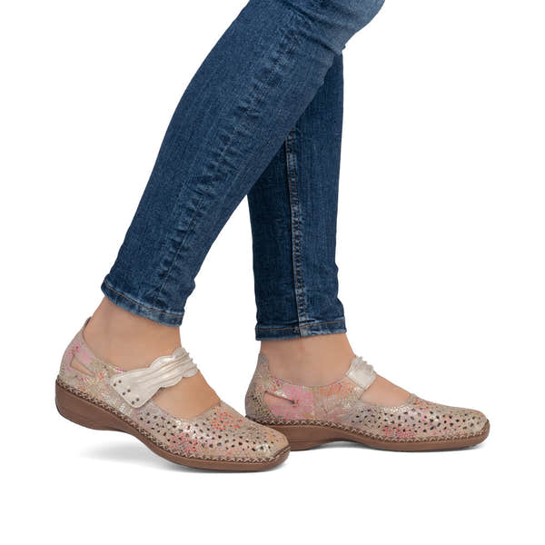 Rieker 41399-92 beige multi leather ladies touch fastening shoes with cutout design and low brown heel.