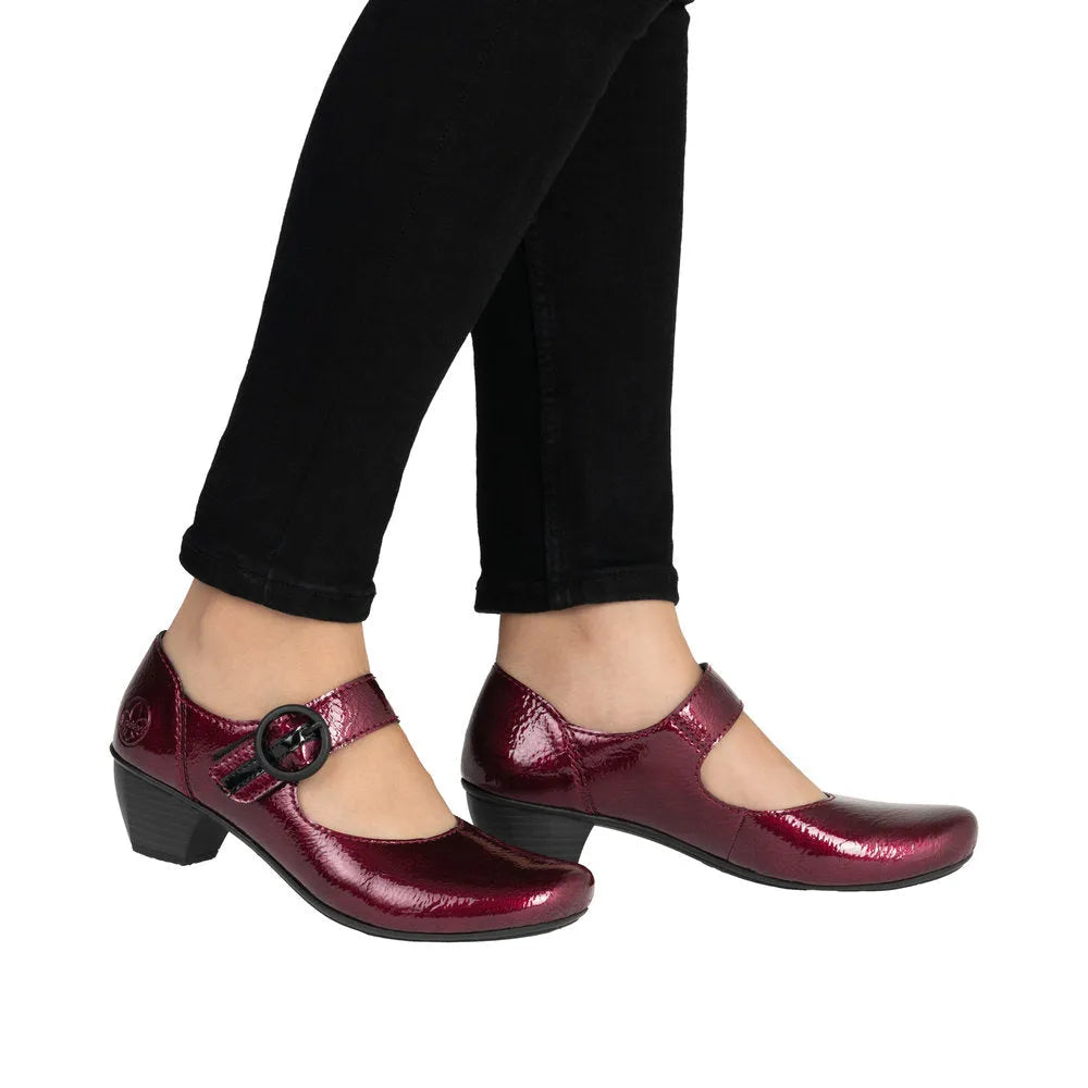 Rieker 41756-33 ladies red touch fastening low-heeled shoes with Mary Jane style, shiny patent finish, and adjustable strap.