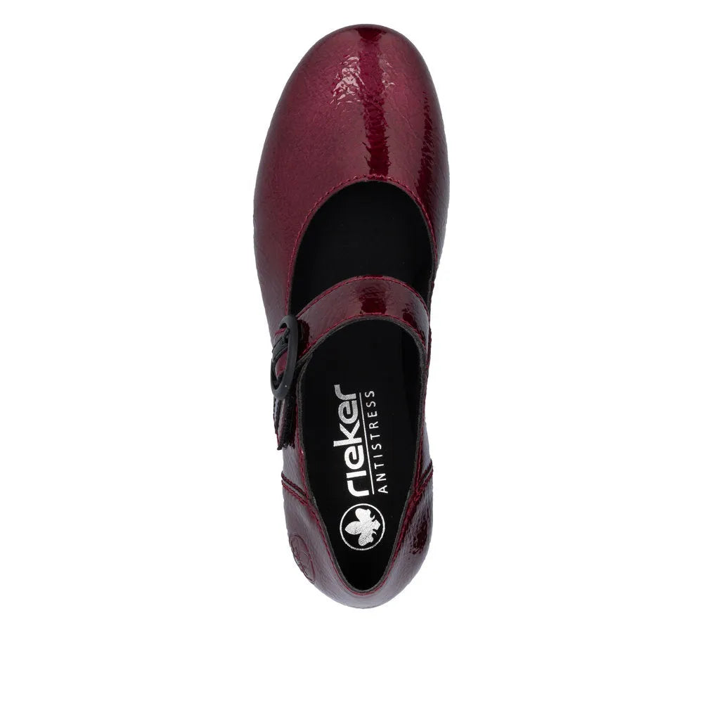 Rieker 41756-33 women's red patent leather touch-fastening heels with a rounded toe and block heel.